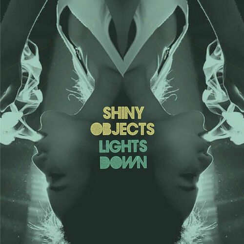 image cover: Shiny Objects - Lights Down on Strange Attraction